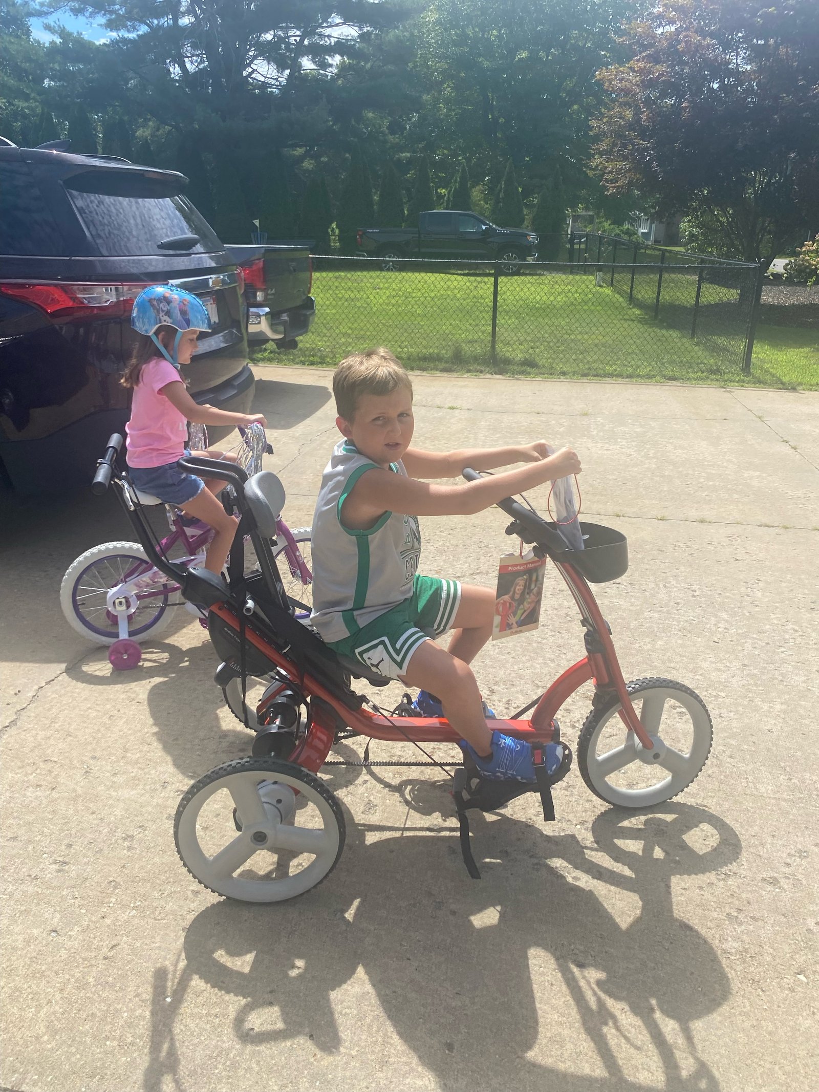 Trike Allows Knox to Ride Along With Sister