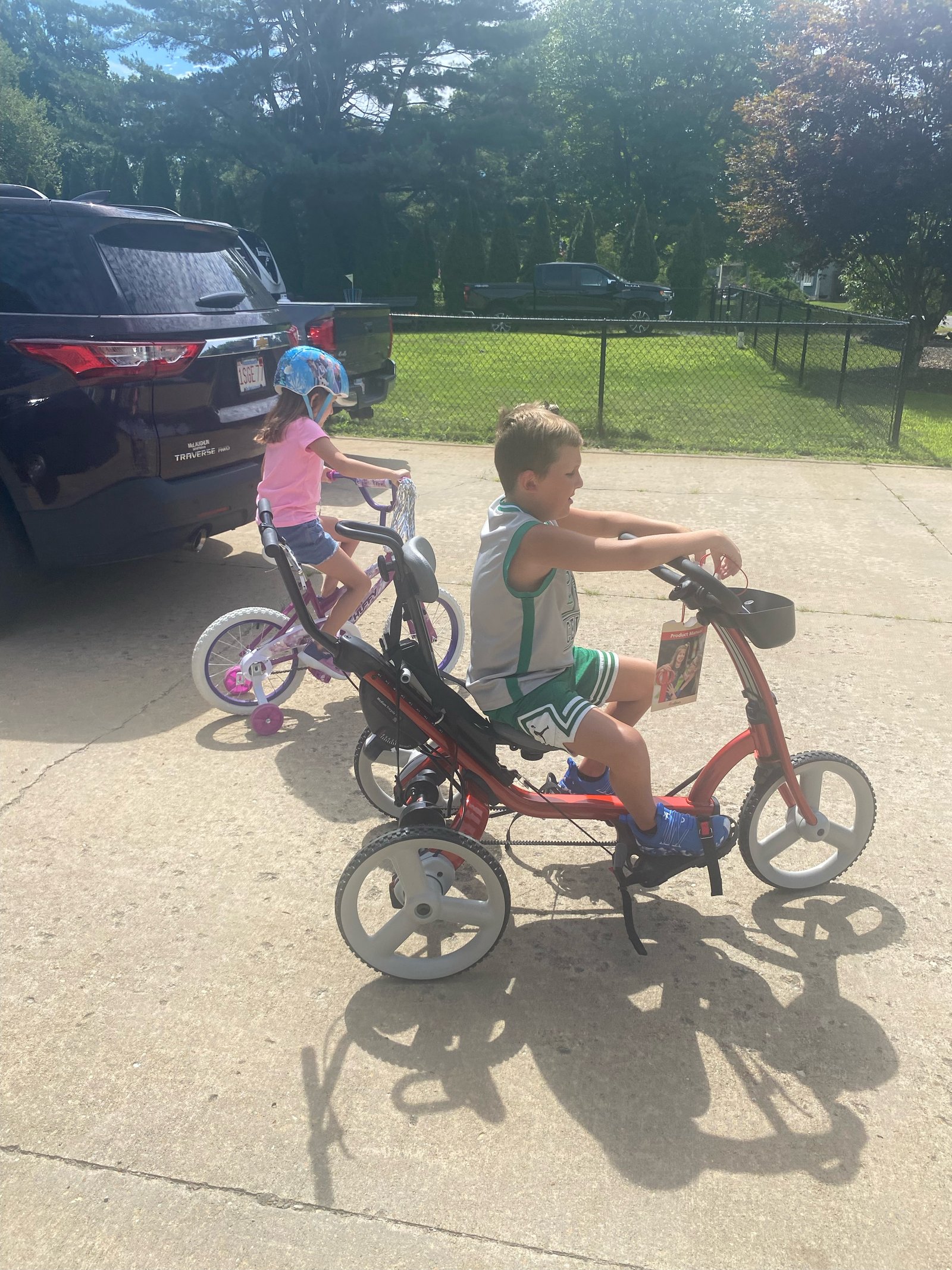 Trike Allows Knox to Ride Along With Sister