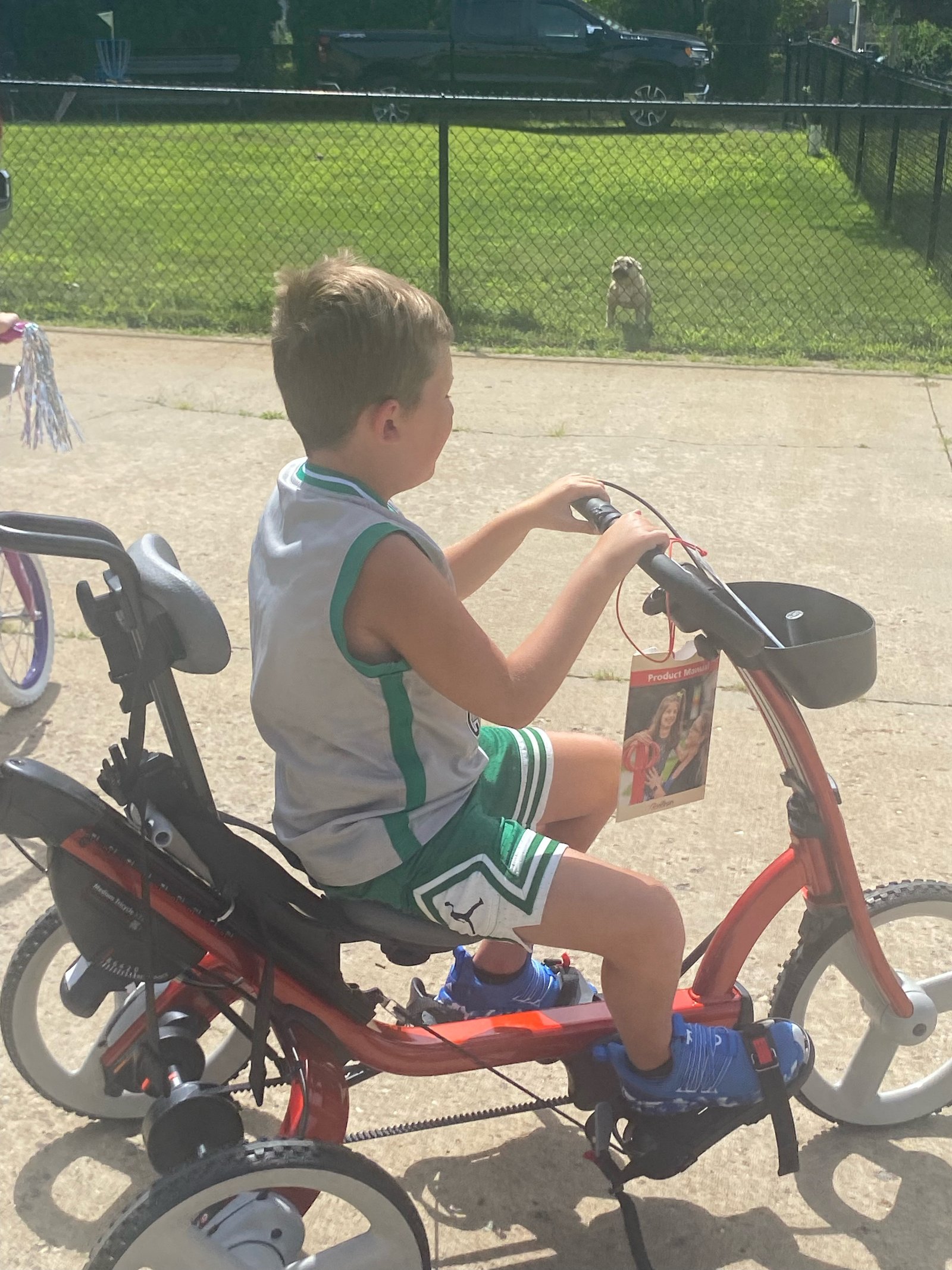 Trike Allows Knox to Ride Along With Sister