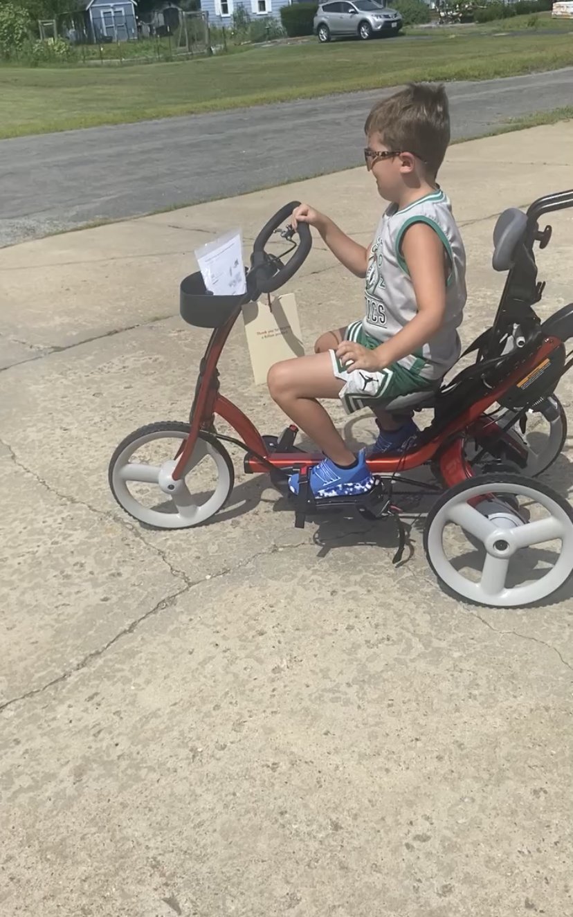 Trike Allows Knox to Ride Along With Sister